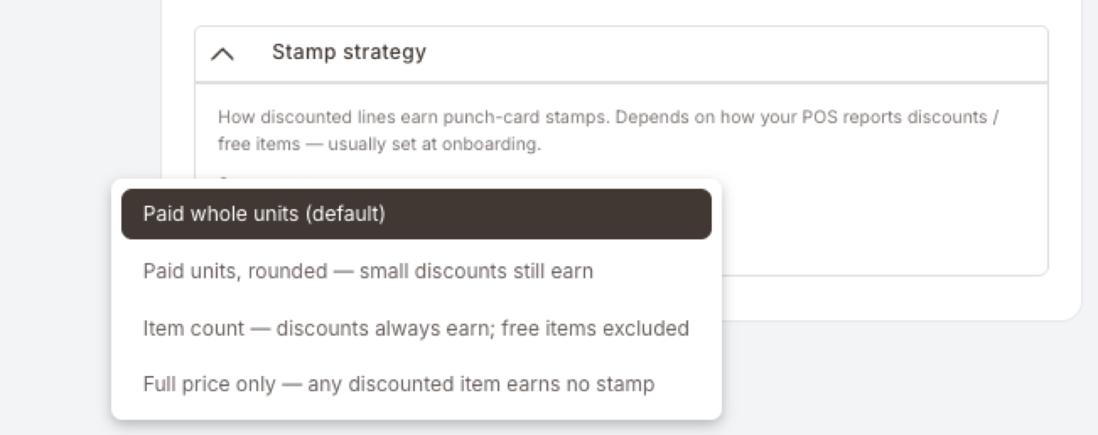 The Stamp strategy dropdown open, showing the four options in order: Paid whole units (default, highlighted), Paid units rounded — small discounts still earn, Item count — discounts always earn; free items excluded, Full price only — any discounted item earns no stamp.